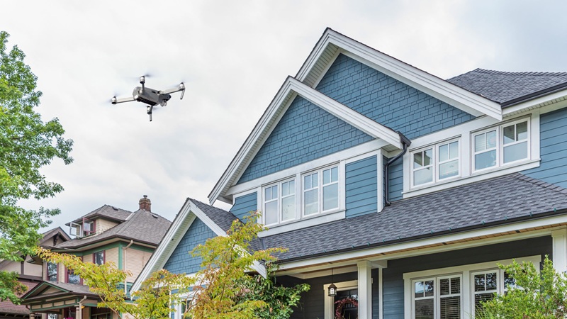 Houses In Suburb At Summer In The North America. Luxury Houses W