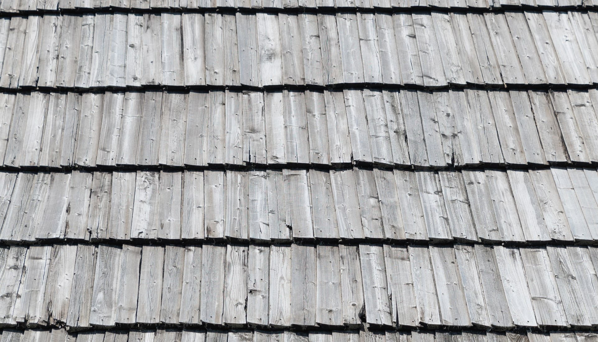 Wood roofing with hail damage